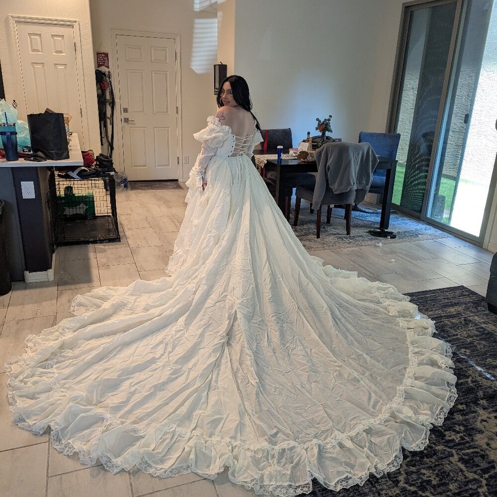 Selkie Ivory Ruffled Off-Shoulder Wedding Gown with Long Train